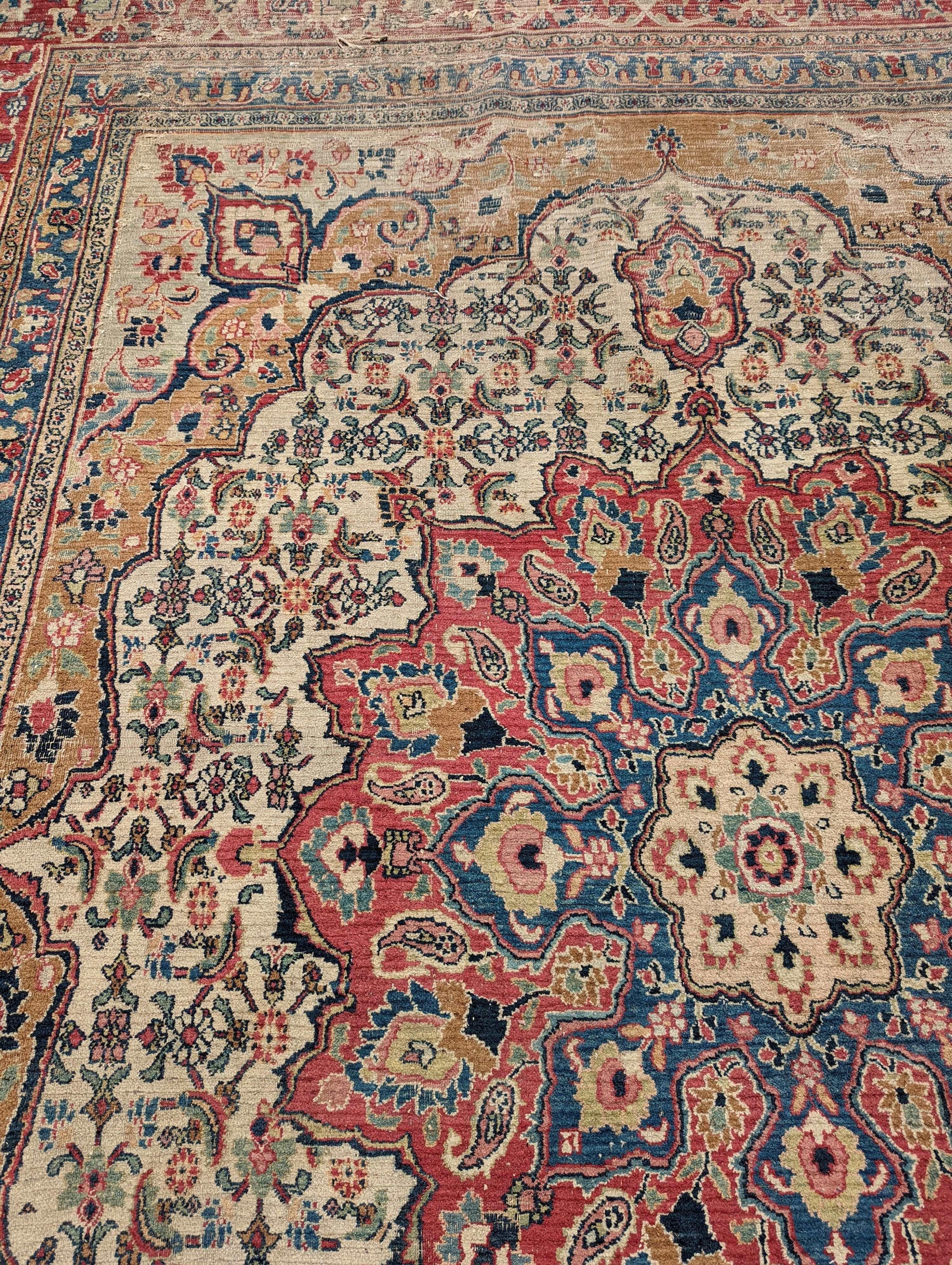 An Isfahan ivory ground carpet, 432 x 330cm